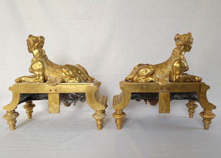 Pair of monumental andirons with Sphinxes, chiseled and gilded bronze - Regency style, Napoleon III period