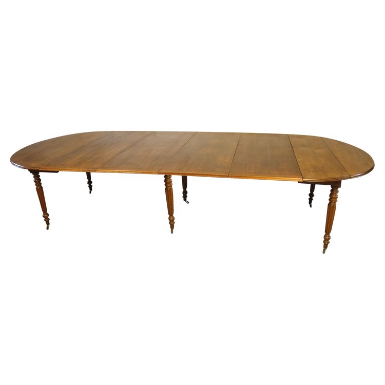 Table à 6 pieds en chêne de forme ovale avec 4 allonges époque milieu 19ème 