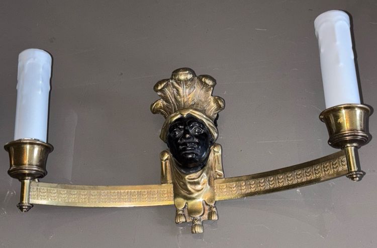 BAGUES House, Indian (or Nubian) wall lights in gilded and patinated bronze