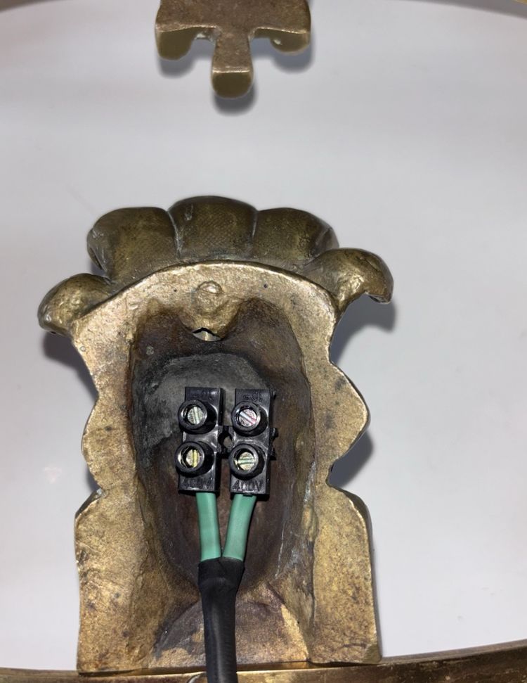 BAGUES House, Indian (or Nubian) wall lights in gilded and patinated bronze