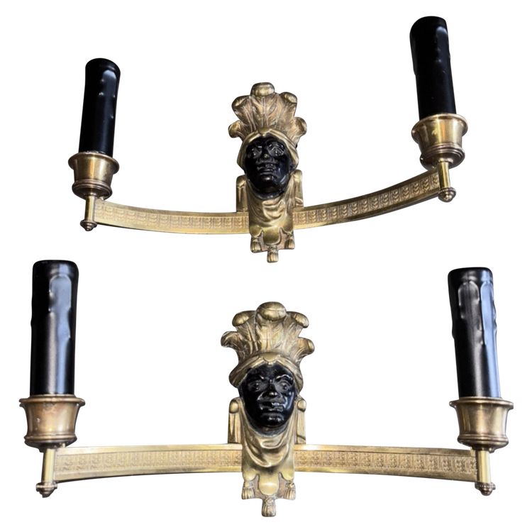 BAGUES House, Indian (or Nubian) wall lights in gilded and patinated bronze