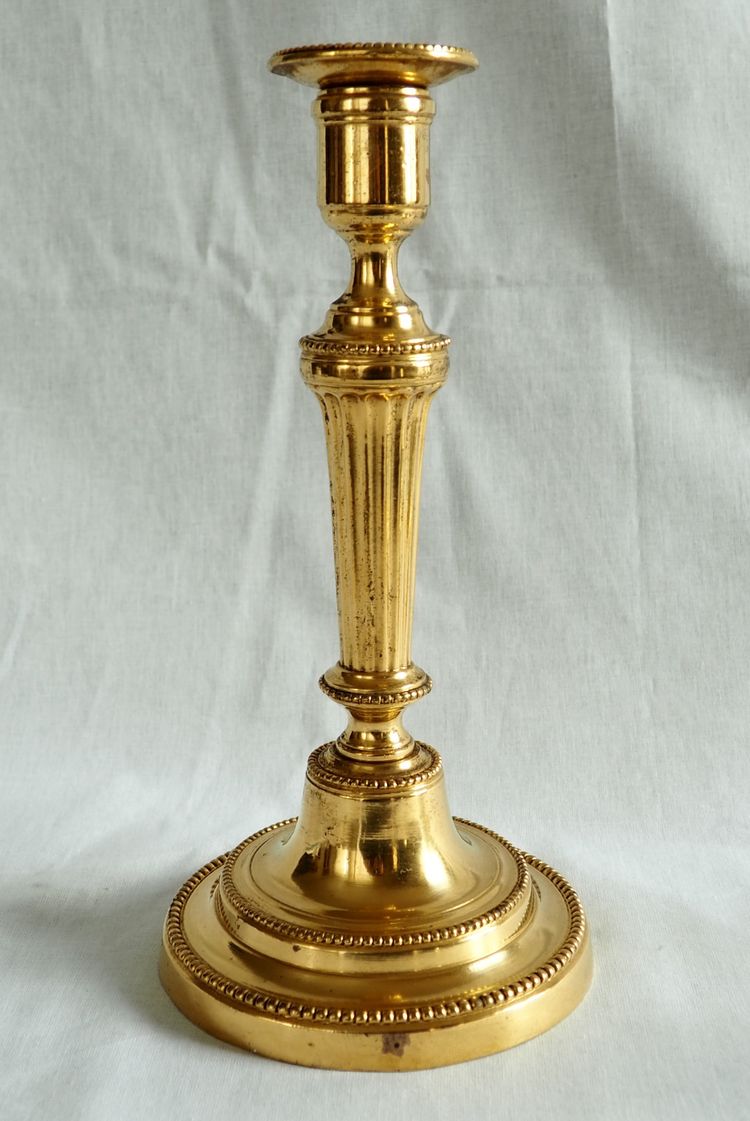 Coppia di candelieri/torce in bronzo dorato al mercurio, epoca Luigi XVI - XVIII secolo