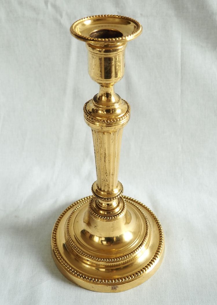 Coppia di candelieri/torce in bronzo dorato al mercurio, epoca Luigi XVI - XVIII secolo