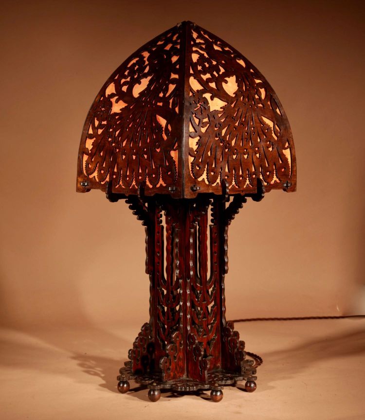 Amsterdam School, 1900-1920. Very impressive and elegant openwork wooden table lamp.