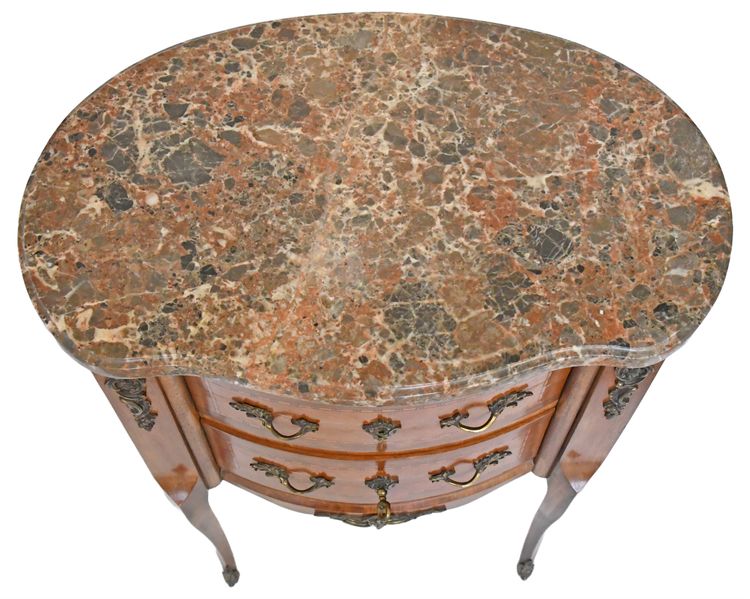 Petite commode de forme rognon de style Transition 