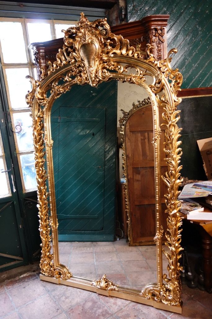 Monumentale paire de miroirs en bois doré, 243 cm