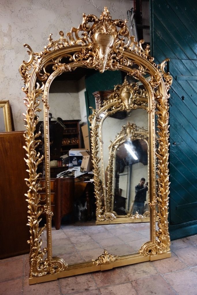 Monumentale paire de miroirs en bois doré, 243 cm