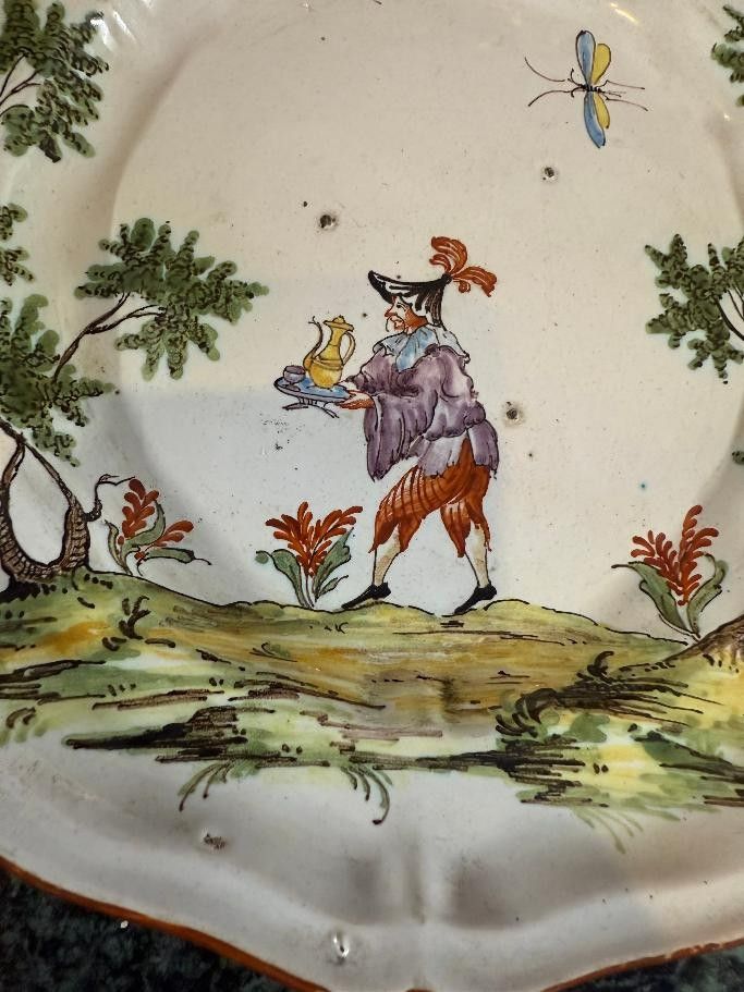 FOUR PLATES OF MILAN EARTHENWARE MANUFACTURED BY FELICE CLERICI 18TH CENTURY