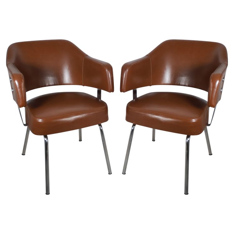 Pair of 50s-60s leatherette armchairs