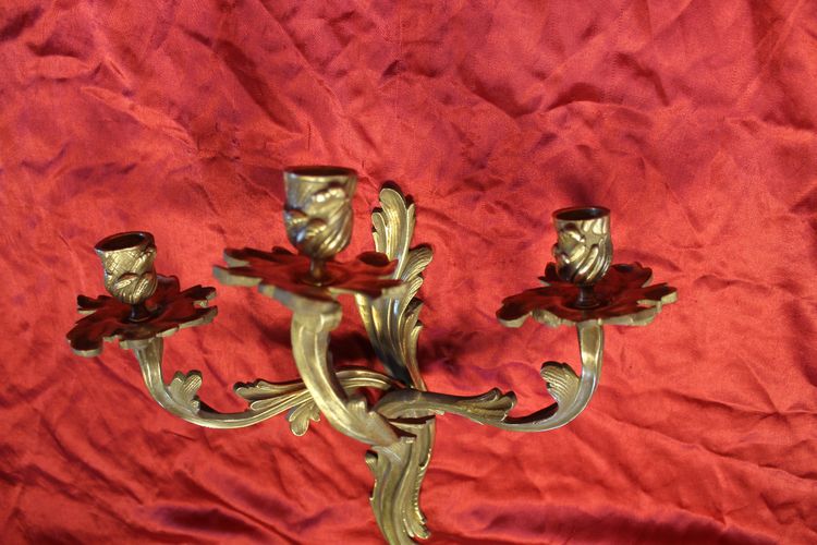 Pair of bronze sconces with 3 light arms in the Louis XV style, 19th century h: 45 cm