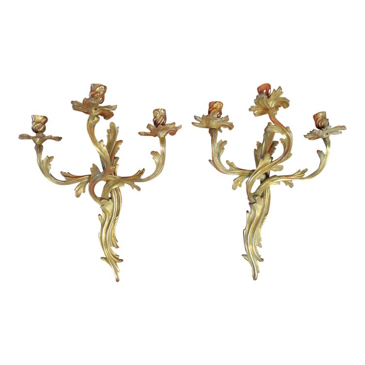 Pair of bronze sconces with 3 light arms in the Louis XV style, 19th century h: 45 cm