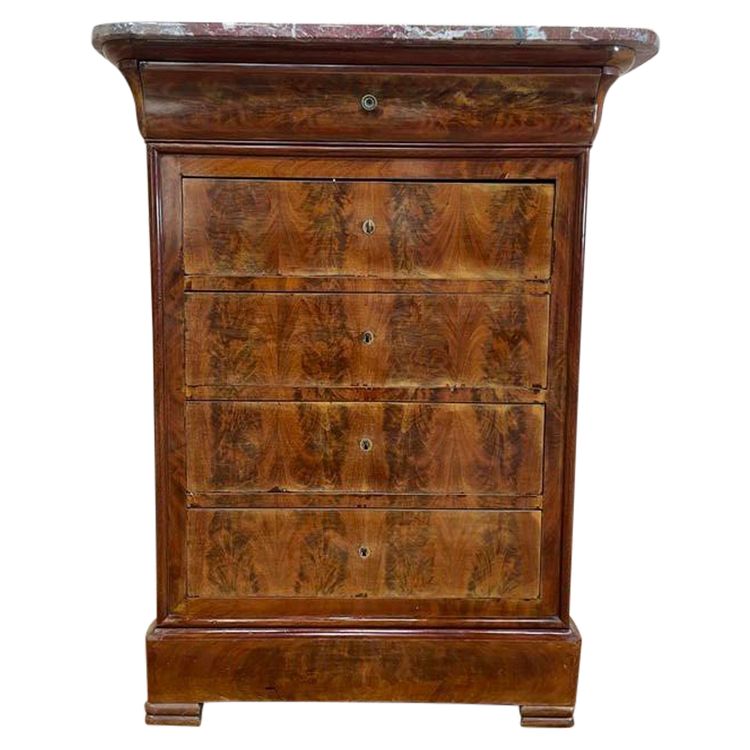 Chiffonnier - Commode époque Louis Philippe en acajou et placage d’acajou. 