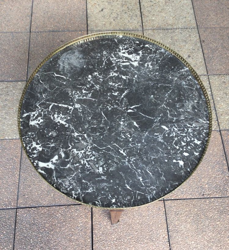 A pedestal table called a "bouillotte table"