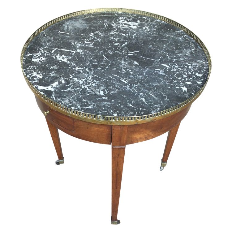 A pedestal table called a "bouillotte table"