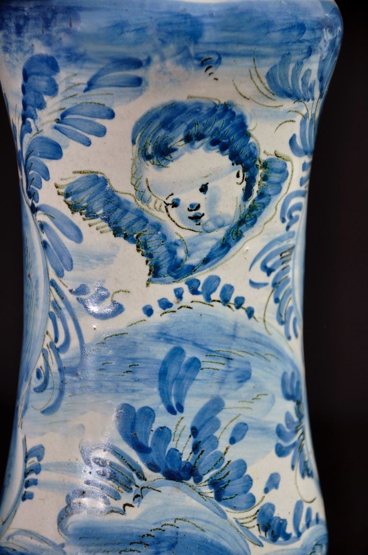 Albarelo in earthenware decorated in blue monochrome with a cherub motif, late 17th century