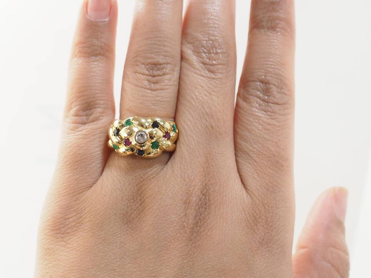 Bague jonc en or jaune et pierres précieuses 