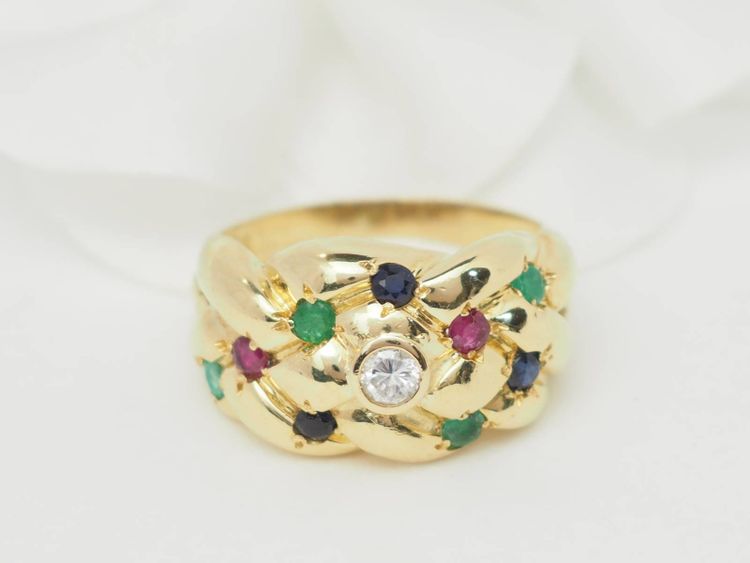 Bague jonc en or jaune et pierres précieuses 