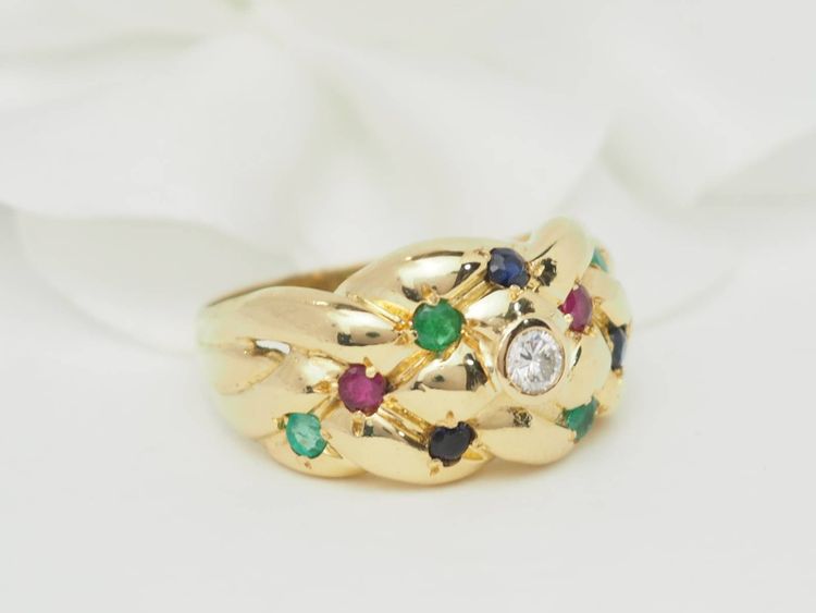 Bague jonc en or jaune et pierres précieuses 
