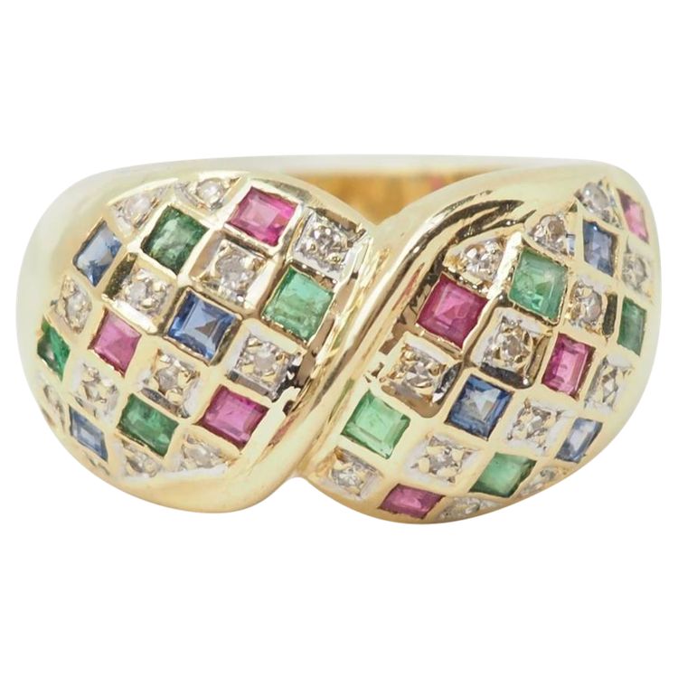 Bague pavée en or jaune, diamants et pierres précieuses