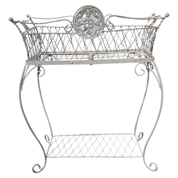 Planter on wrought-iron legs