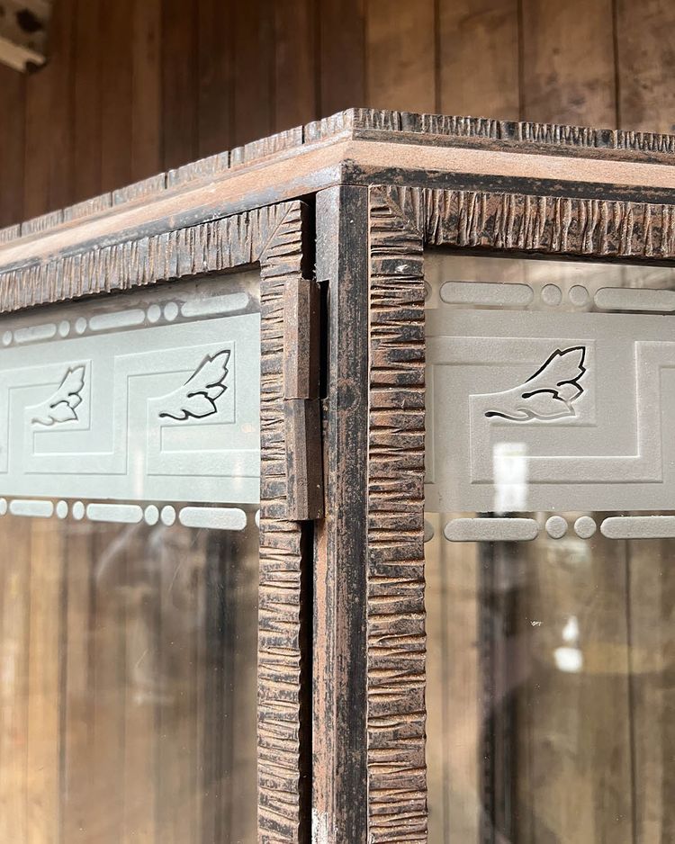 Hammered iron display cabinet