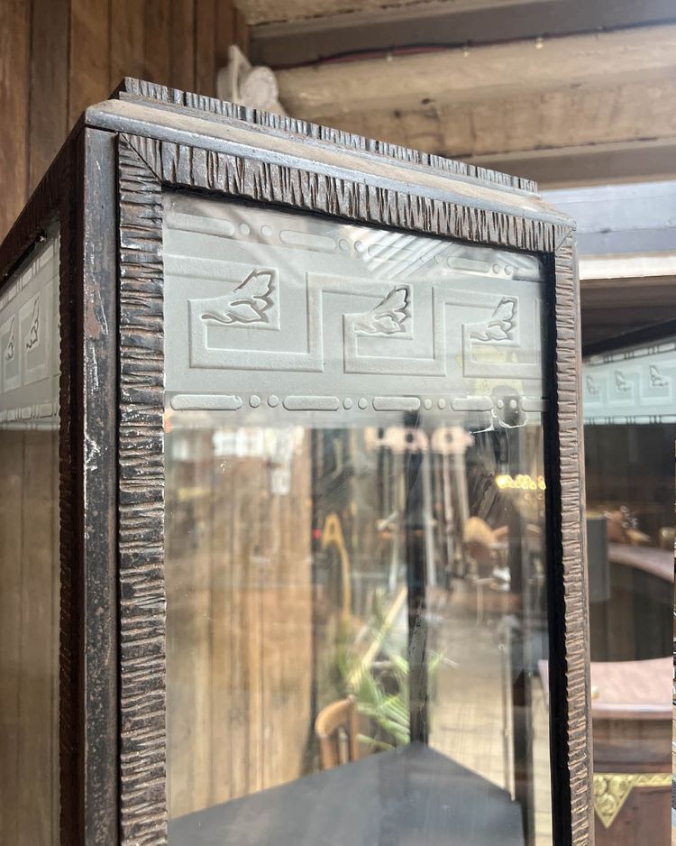 Hammered iron display cabinet