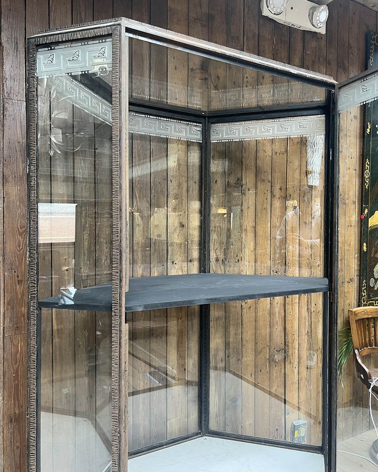 Hammered iron display cabinet