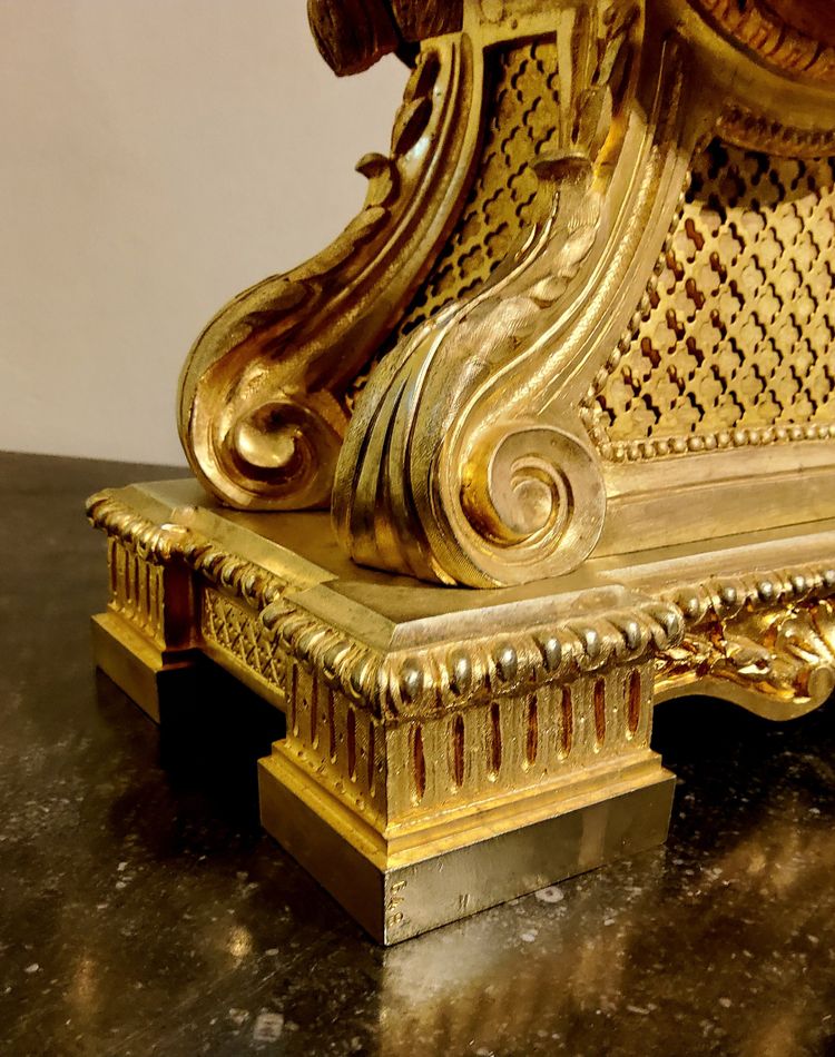 Louis XVI style clock in gilded bronzes with Lions' heads Greek decor 19th century