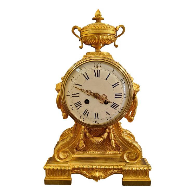 Louis XVI style clock in gilded bronzes with Lions' heads Greek decor 19th century