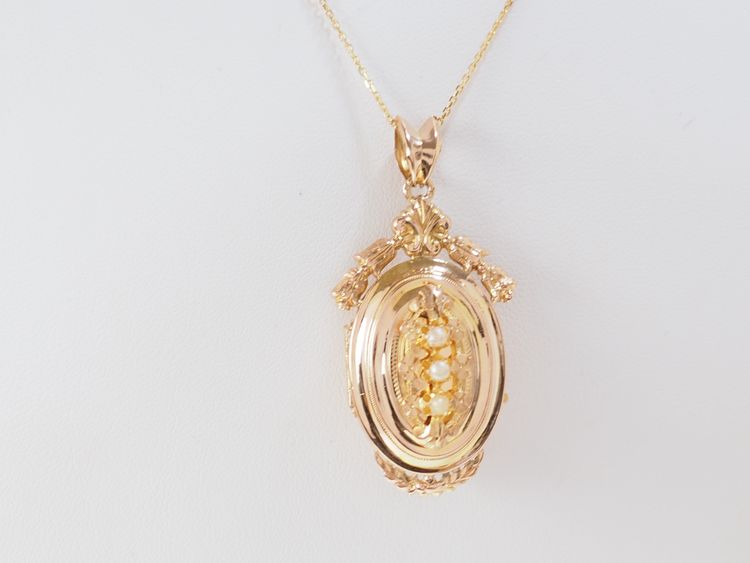 Collier pendentif cassolette en or jaune et perles fines