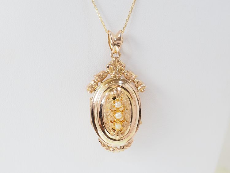 Collier pendentif cassolette en or jaune et perles fines