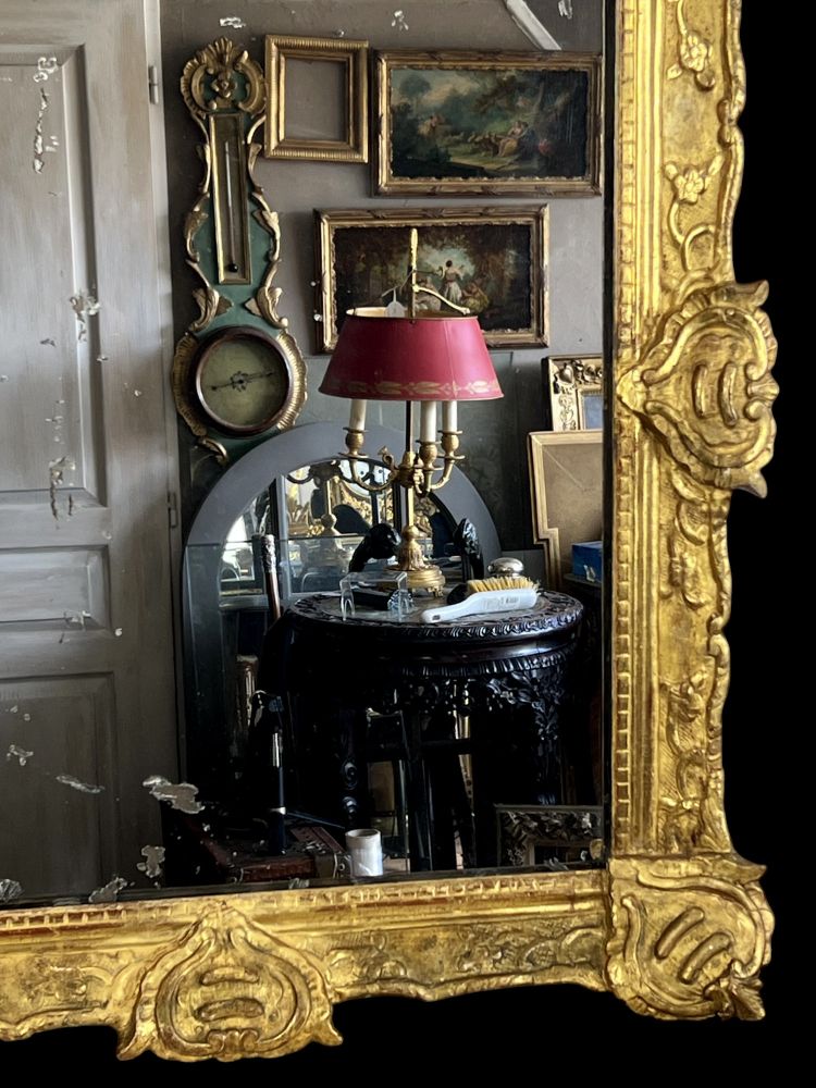 LARGE XVIIIth CENTURY MIRROR IN GOLDEN SCULPTURED AND STUQUED WOOD WITH MERCURY ICE