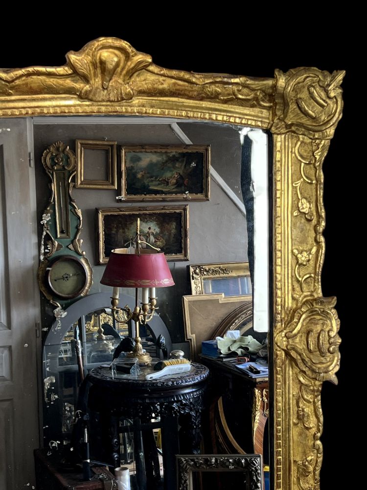 LARGE XVIIIth CENTURY MIRROR IN GOLDEN SCULPTURED AND STUQUED WOOD WITH MERCURY ICE