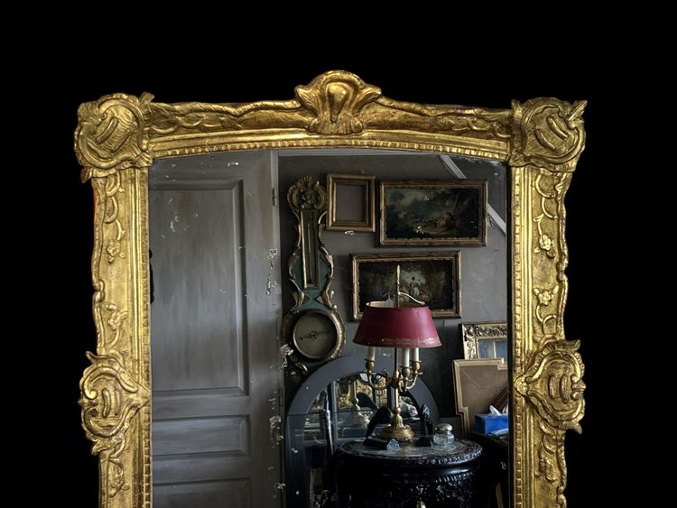 LARGE XVIIIth CENTURY MIRROR IN GOLDEN SCULPTURED AND STUQUED WOOD WITH MERCURY ICE