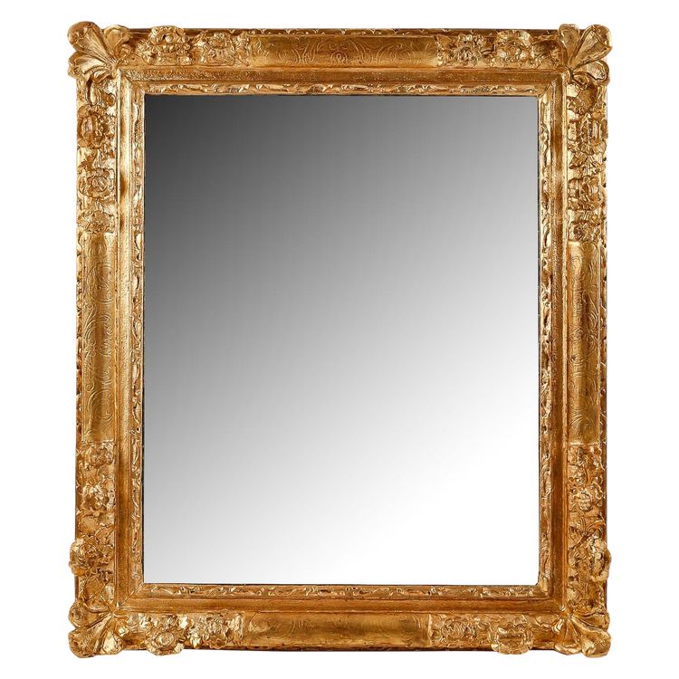 Miroir en bois et stuc sculpté et doré d’époque Régence vers 1720