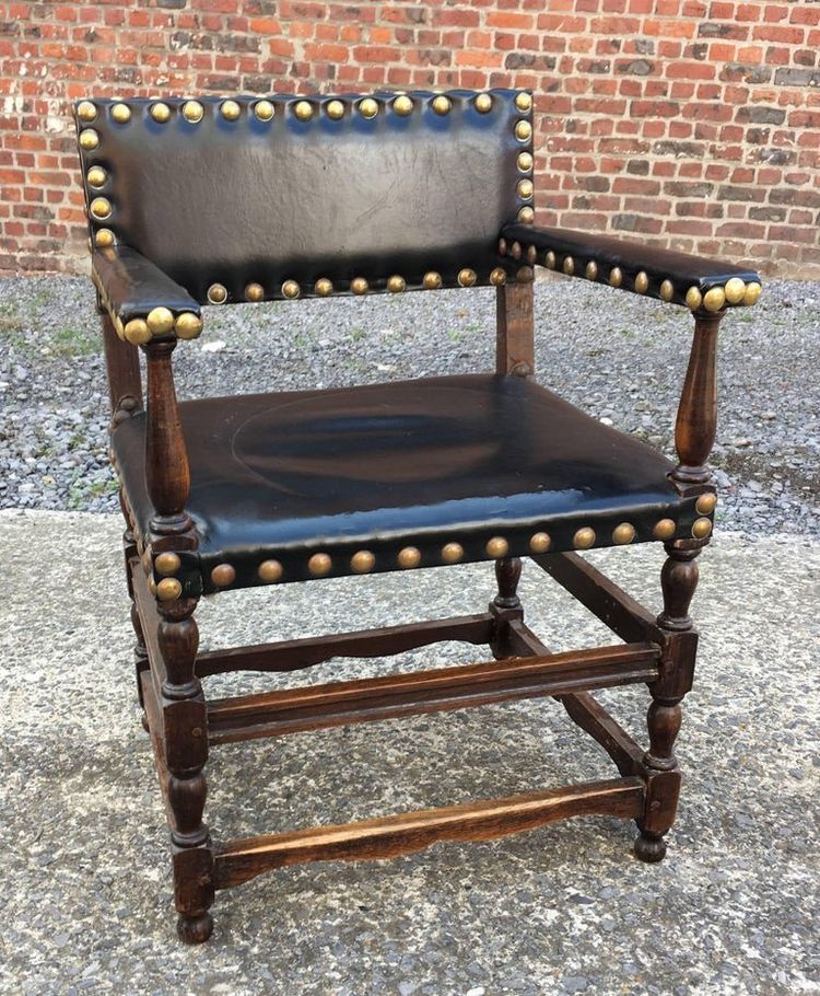 Two antique Louis XIII armchairs that could form a pair