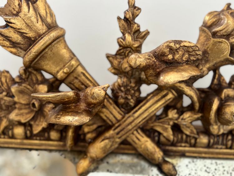 Miroir a pare closes de style Louis XVI en bois et stuc doré XIX siècle