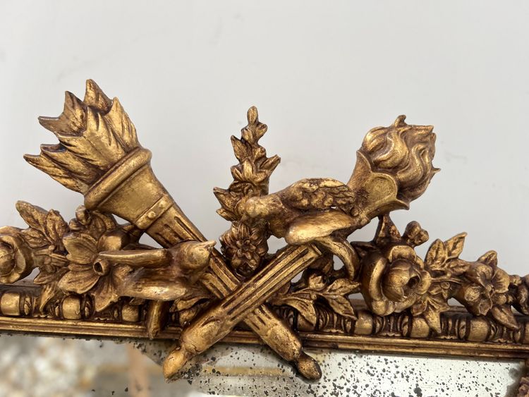 Miroir a pare closes de style Louis XVI en bois et stuc doré XIX siècle