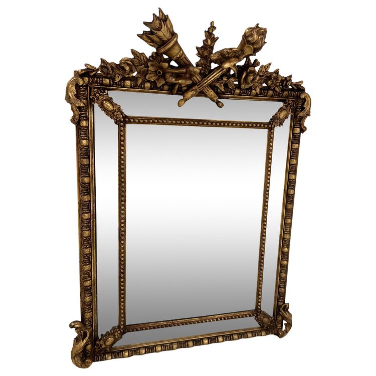 Miroir a pare closes de style Louis XVI en bois et stuc doré XIX siècle