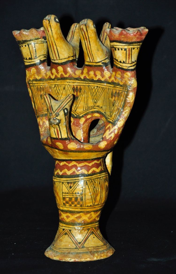 Late 19th-century Kabyle pottery candlestick with polychrome geometric decoration