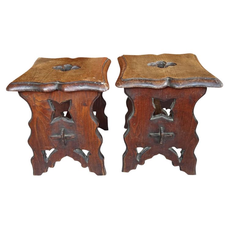 Pair of antique carved wood stools