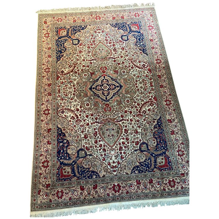 Large hand-knotted wool Persian Isfahan rug large central medallion richly decorated with flowers