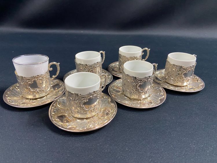 Suite di 6 coppe e 6 piattini in argento massiccio in stile Regency