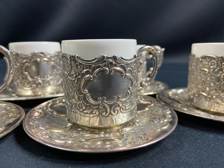 Suite di 6 coppe e 6 piattini in argento massiccio in stile Regency