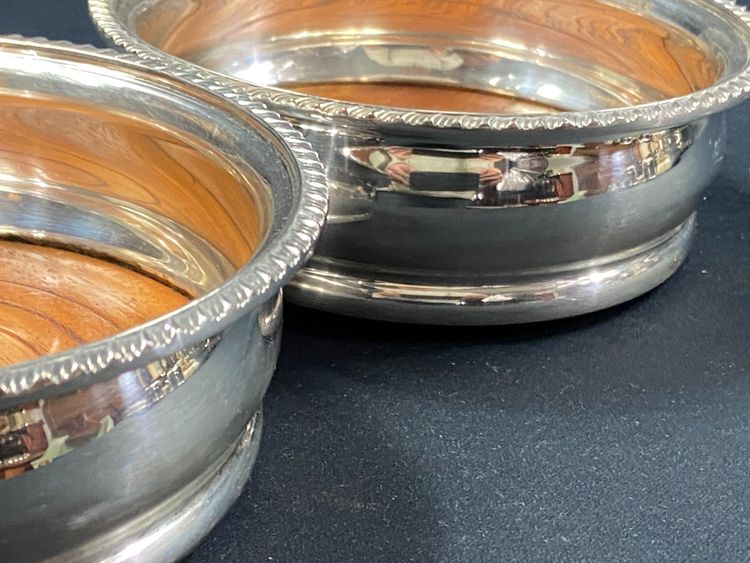 Pair of Louis XV style silver-plated metal coasters