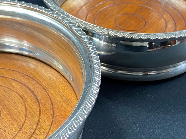 Pair of Louis XV style silver-plated metal coasters