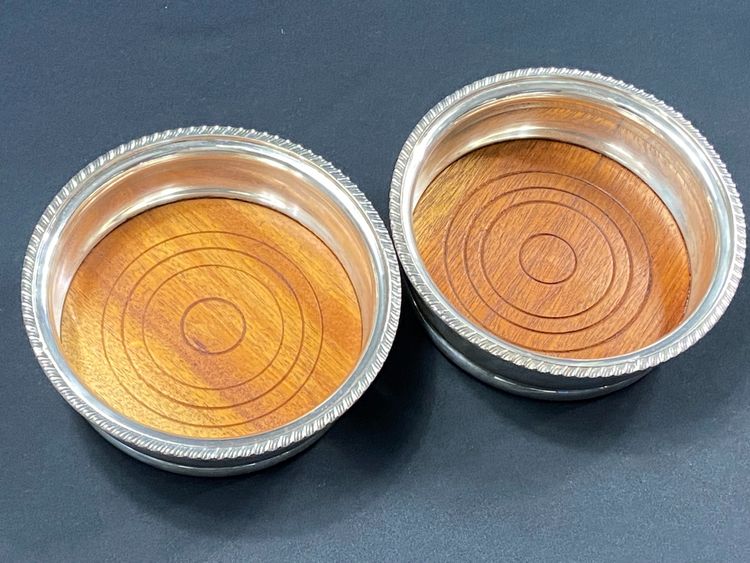 Pair of Louis XV style silver-plated metal coasters