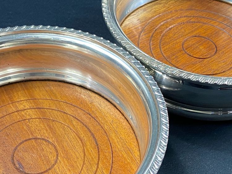 Pair of Louis XV style silver-plated metal coasters
