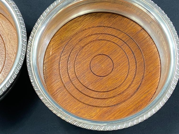 Pair of Louis XV style silver-plated metal coasters