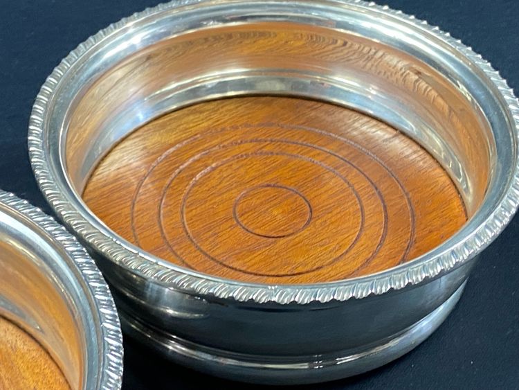 Pair of Louis XV style silver-plated metal coasters